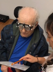 Dr. Wong performs an eye exam